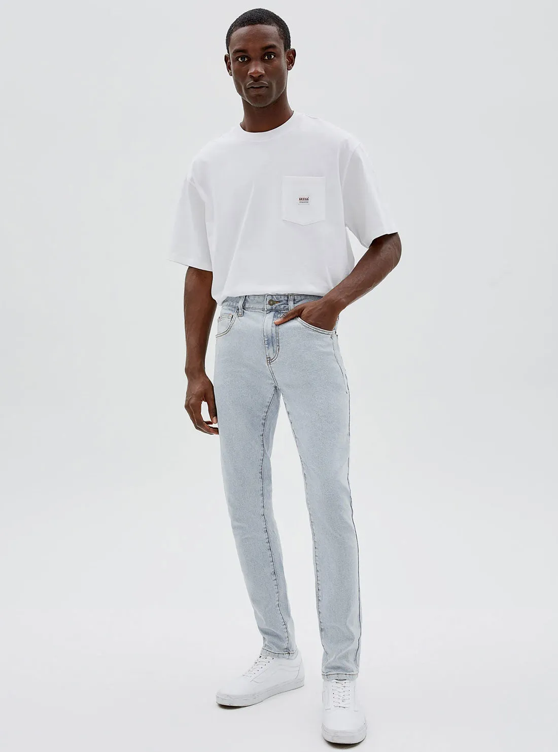 Guess Originals Mid-Rise Skinny Denim Jeans In Osborn Light Wash