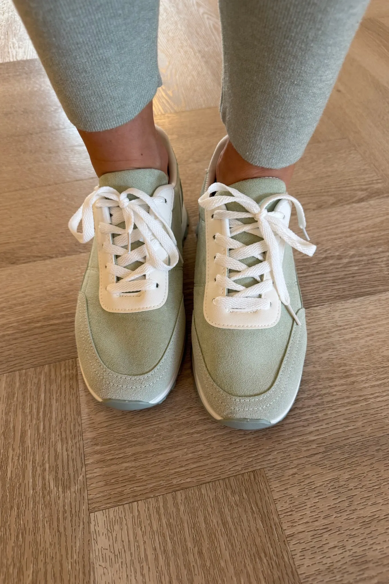 PALE GREEN AND WHITE FAUX SUEDE TRAINERS